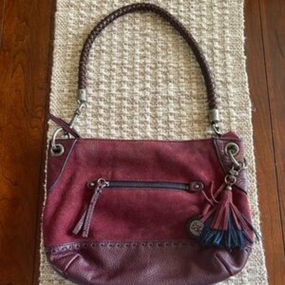 The Sak bag. Suede and leather. Some peeling on strap as shown in pics